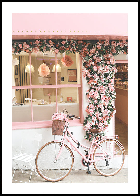 Póster Uma bicicleta rosa em flor