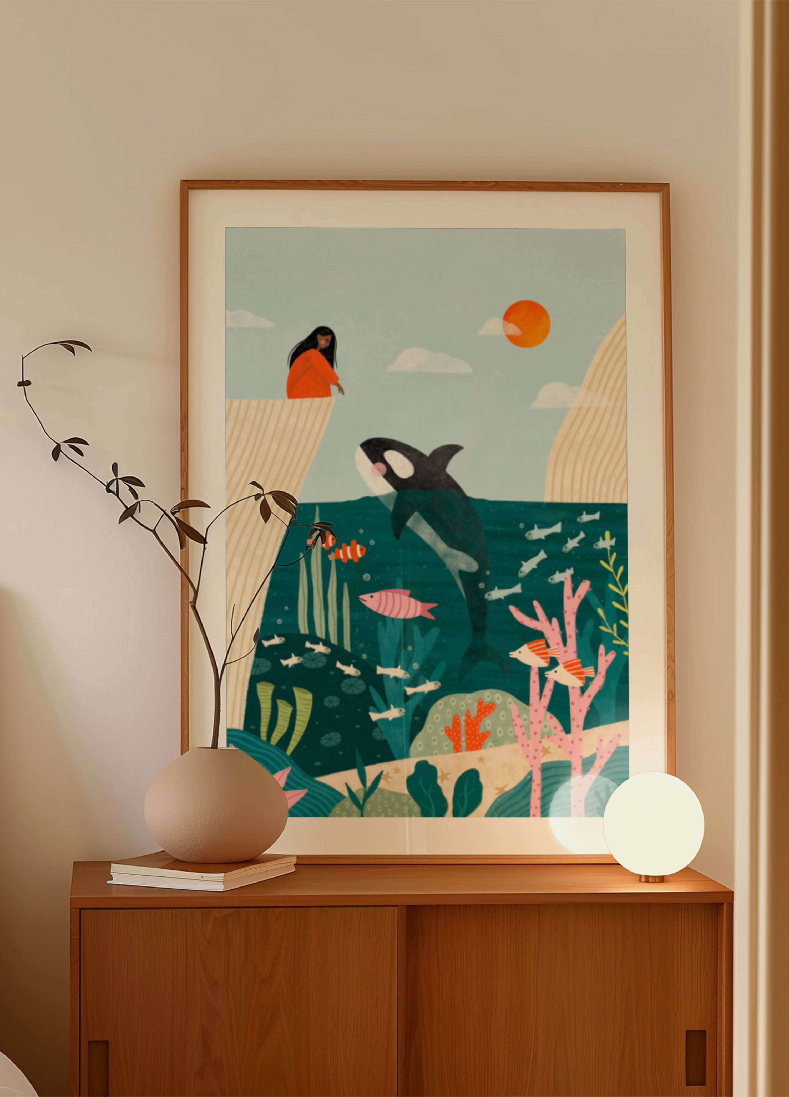 Menina observa a vida no oceano