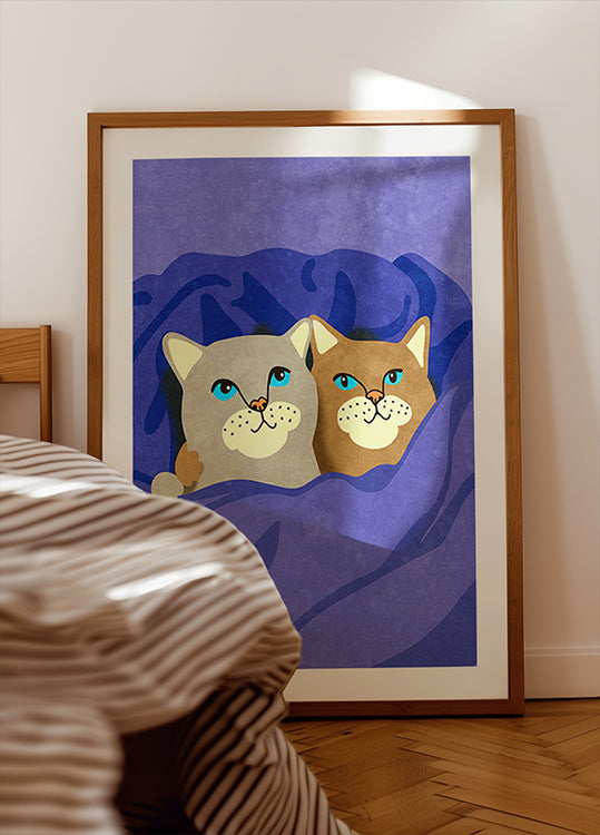 Gatos na cama